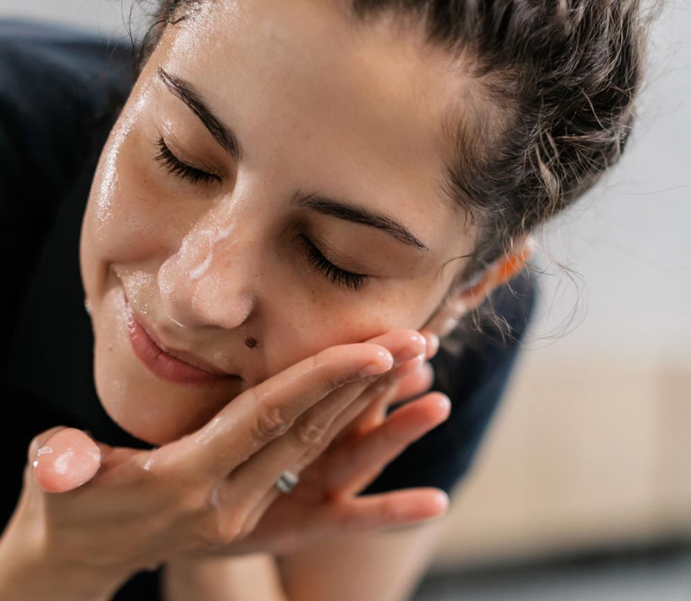 Woman Washing Her Face